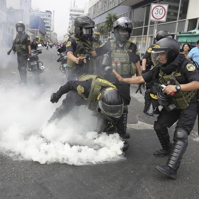 Peru police use tear gas to block protesters from marching
